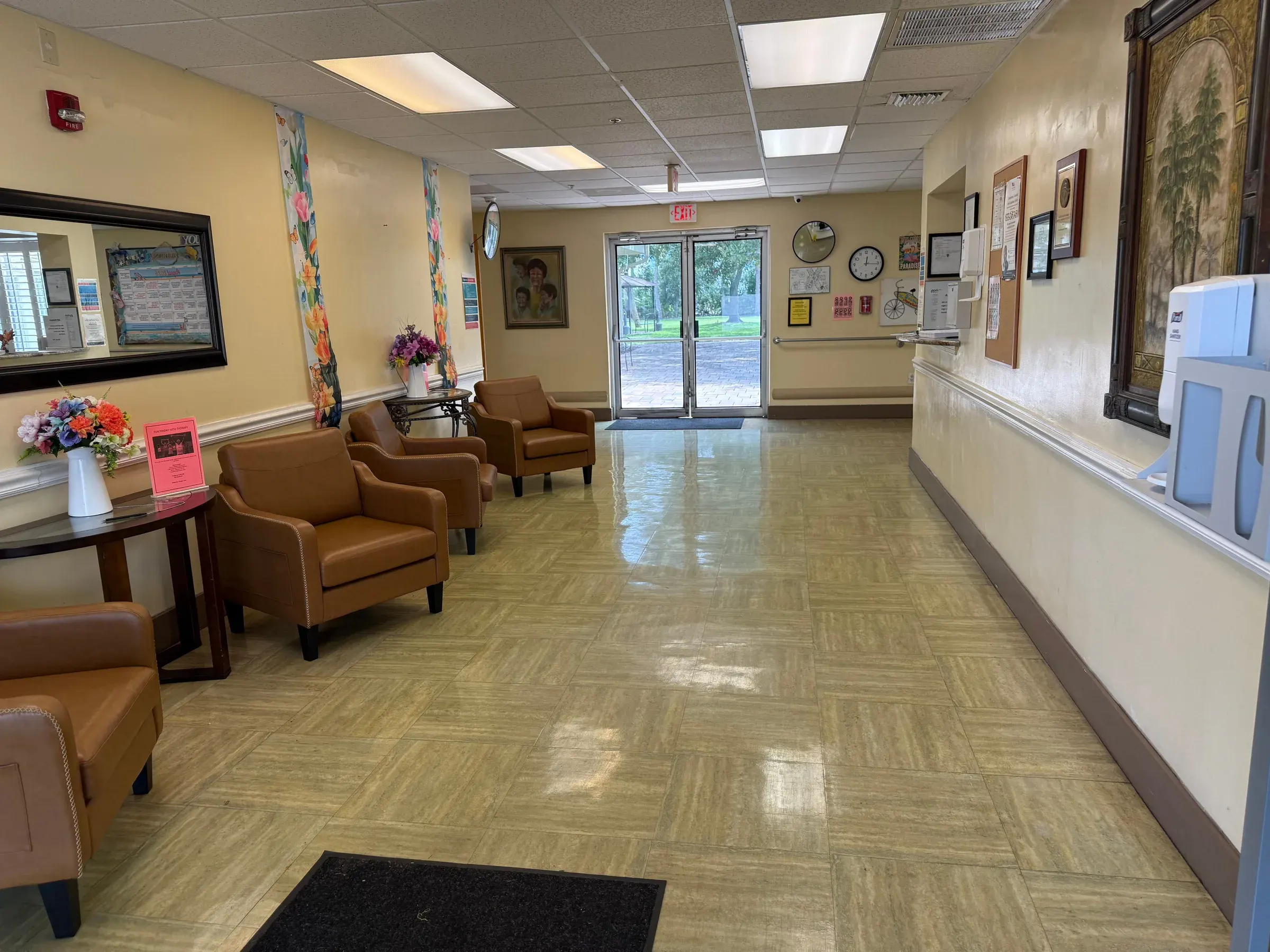 The lobby at Vivo Healthcare Fort Pierce, looking toward the front doors